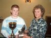 Francis Loane Jnr receives his awards from Mary McKee
