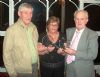Founding club members Patsy McCann and Norman Doherty receive their 25th anniversary plaques
