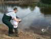 Peter Walls and his son Ronan play a trout at the Moyola Open Day 2008