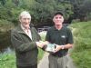 Patsy McCann presents Tommy McGrath with 3rd place prize