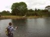 A young anglers casts for a trout