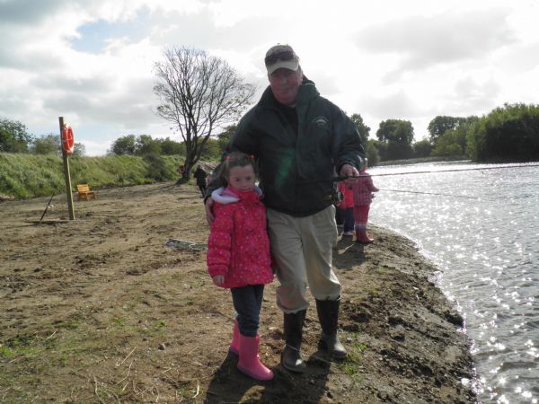 Sean with one of his Grandchildren.